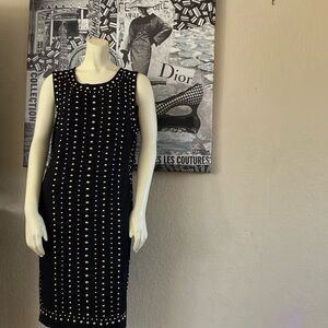 Beautiful black and silver Carmen Marc Valvo dress. New with tags.